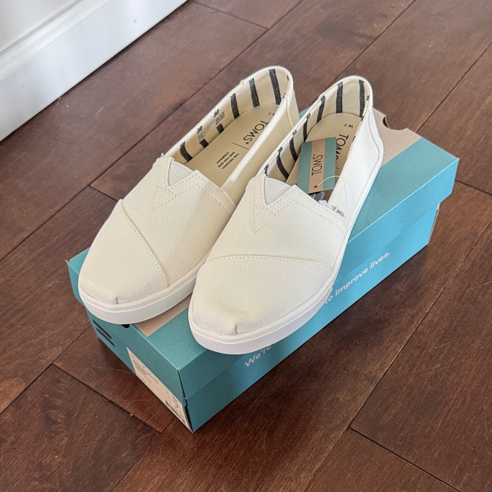 TOMS Cream Canvas Slip-Ons